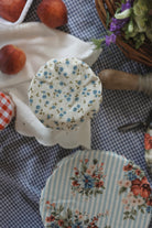 Home-sewn cotton bowl and jar covers lined with natural cotton